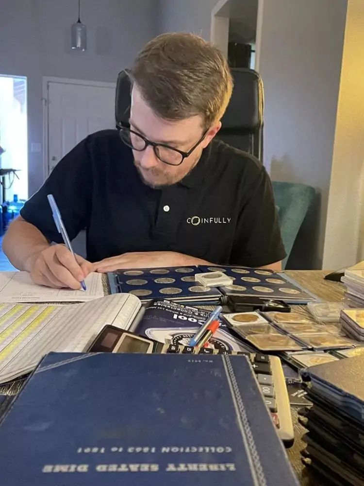 Coin Appraisal Cost: How Much Does It Cost To Get Coins Appraised? 3 Coin Appraisal Cost - Numismatic expert appraising coins - Coinfully