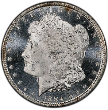 1884 Morgan silver dollar coin featuring a profile of Lady Liberty.