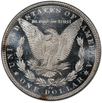 U.S. one dollar coin featuring an eagle with the text "In God We Trust" and "United States of America."